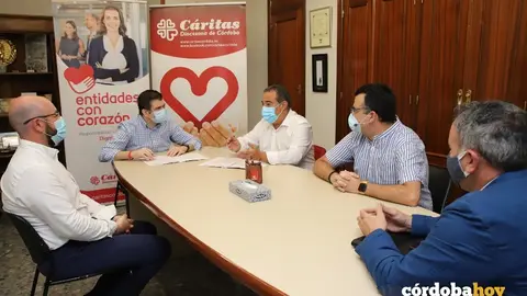 Reuni&oacute;n entre representantes de C&aacute;ritas y del BNI C&oacute;rdoba