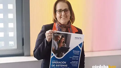 La delegada de Econom&iacute;a y Empleo y presidenta del Imdeec, Blanca Torrent, con el cartel del curso